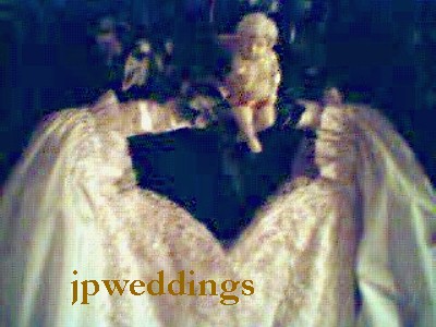 jpwhitegown.JPG (39459 bytes)